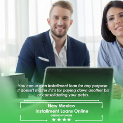 A man and a woman sitting at a table in front of a laptop talking about New Mexico installment loans online