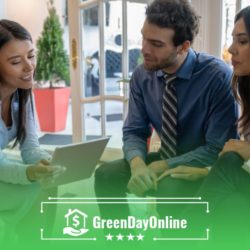 A group of people sitting around a table searching for a payday loan online