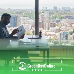 A man sitting at a desk reading a book on what payday loans are and how they work