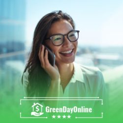 A woman wearing glasses talking on a cell phone to request for a payday loan without a bank account