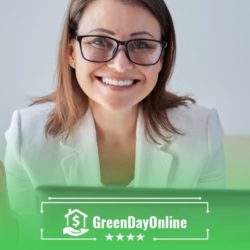 A woman wearing glasses sitting in front of a laptop looking for a payday loan online